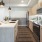 Open kitchen and living room with plenty of natural light.