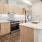 Open kitchen and living room with plenty of natural light.