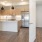 Open kitchen and living room with plenty of natural light.