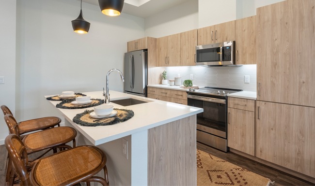 Kitchen Open kitchen and living room with plenty of natural light.